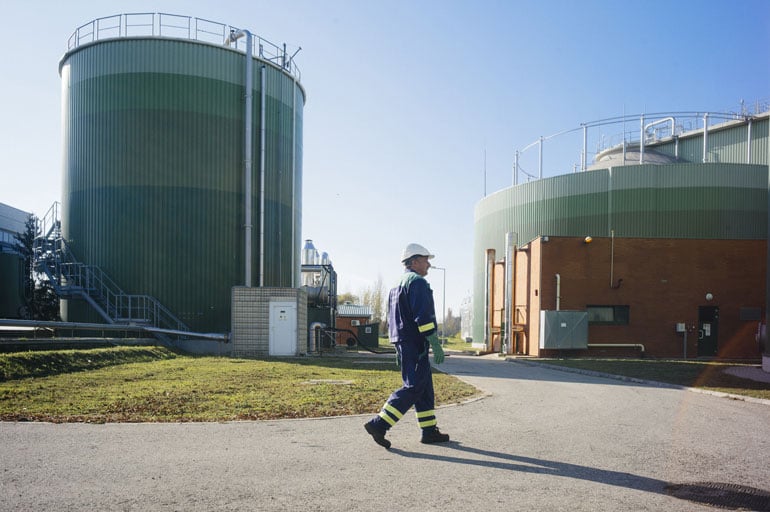 veolia-employee-walking-biogas-plant